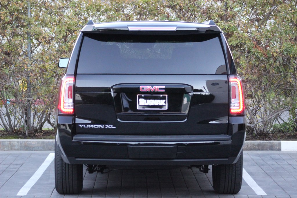 Comparison gmc yukon xl 2016 vs cadillac escalade esv luxury 2017
